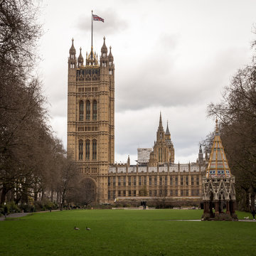 Palace of Westminster, London. A view from Victoria Tower Gardens looking towards The Houses of Parliament, the seat of UK politics and government.