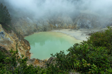 Colourful Sulphureous Crater lakes Wawo muda volcano in Flores in Indonesia