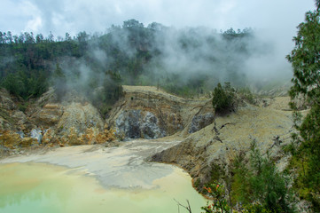 Colourful Sulphureous Crater lakes Wawo muda volcano in Flores in Indonesia