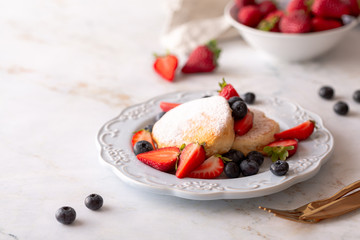 Trendy homemade japanese pancakes for breakfast with berries