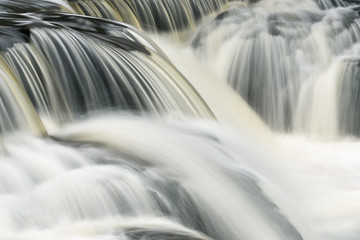 Landscape of Bond Falls cascade captured with motion blur, Michigan's Upper Peninsula, USA