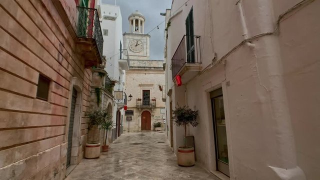 Walking charming white streets of Locorotondo in Puglia, Italy