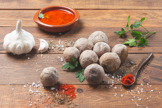 Papas arrugadas con mojo . Typical canarian dish, potatoes with mojo pic&oacute;n. Typical Spanish and Canarian tapas concept .