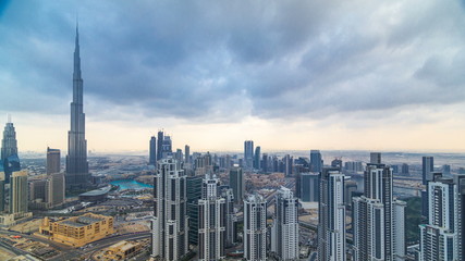 Fototapeta na wymiar Beautiful panoramic skyline of Dubai timelapse, United Arab Emirates. View of world famous skyscrapers.