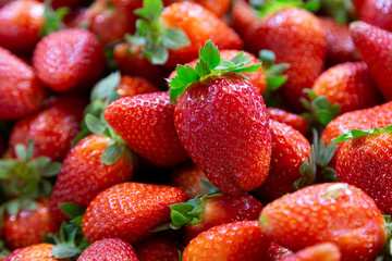 Red ripe strawberries background. Close up, top view. Full Frame Shot Of Strawberries At Market