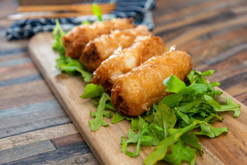 pork spring rolls Rice cakes stuffed with a pork stuffing accompanied by sauce