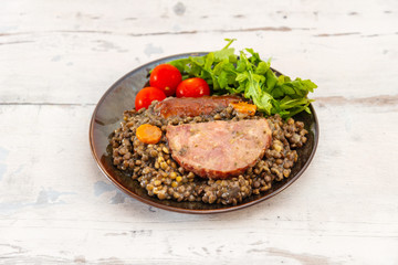Green lentils with smoked pork sausage smoked choice, carrots and onions