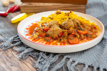 Kofta Tagine Moroccan Meatballs Served With Semolina and Vegetables