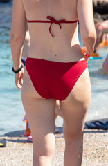 Woman in a swimsuit on the beach