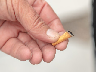 Cigarette in the hands of a man