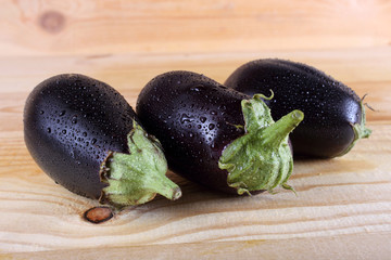 Aubergines on table