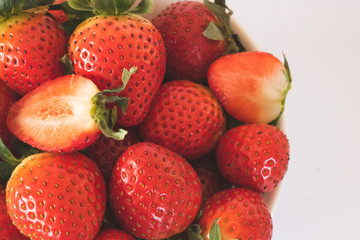 Large ripe strawberries on a white background