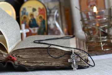 The Silver Cross and the old Holy Bible