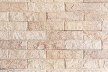 Background and texture stone cladding wall.