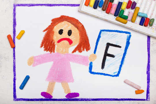 School grades. Sad student with exam or test result. Girl holding report card with F grade. Photo of colorful hand drawing.