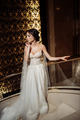 Gorgeous bride in the gold hotel