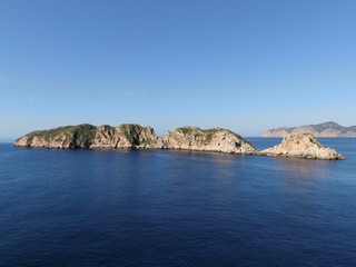 Seaview of the beach of the Mallorca coastline with turquoise waters and blue sky	