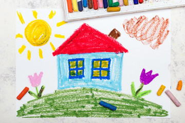 Colorful drawing: House with red roof on the hill. Idyllic landscape