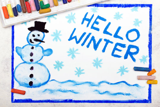 Photo of colorful drawing: Happy snowman and words HELLO WINTER.