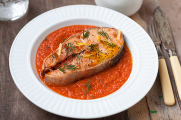 Wild Salmon Steak with Roasted Tomato Sauce Garnished with Dill and Lemon Zest