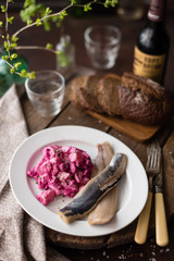 Homemade Beet and Potato Salad Served with Salted Herring Fillet