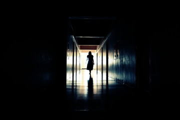 Walking Ghost. The spirit of man in the tunnel. The light at the end of the corridor. - Powered by Adobe