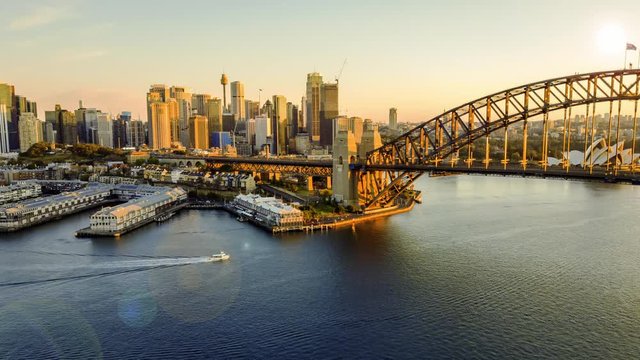 4k time lapse hyperlapse or drone lapse at Sydney city harbour during sunrise. 