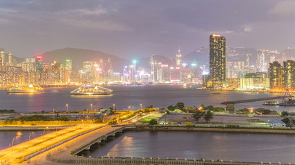 Fototapeta na wymiar Top view of Hong Kong day to night, View from kowloon bay downtown timelapse
