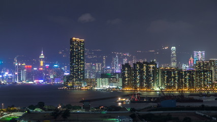 Top view of Hong Kong at night, View from kowloon bay downtown timelapse