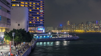 Avenue of Stars in Hong Kong at night timelapse. It honours celebrities of the Hong Kong film...