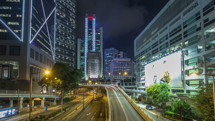 Fototapeta na wymiar Hong Kong traffic timelapse hyperlapse near bank tower in Central District of Hong Kong.