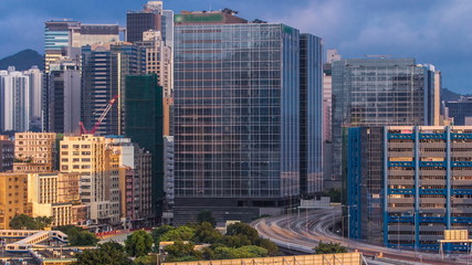 Fototapeta na wymiar Top view of busy traffic day in finance urban timelapse, hong kong city