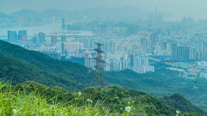 Day to night transition from Fei ngo shan Kowloon Peak night timelapse Hong Kong cityscape skyline.