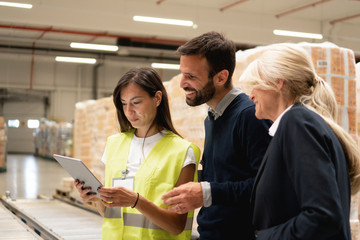 Managers checking the list of products