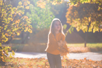  Girl, autumn, ginger color jumper, garden