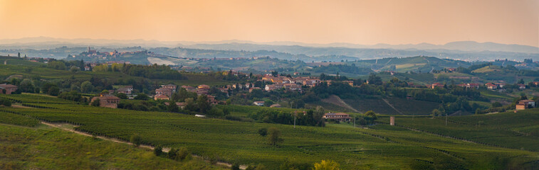 Langhe vineyards sunset panorama, of the most important wine area of Italy. Unesco Site, Piedmont, Northern Italy Europe.