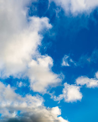 Fantastic clouds against blue sky, panorama