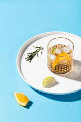Cocktail concept on blue surface