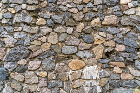 Texture of the wall made of Stones, stock photo.
