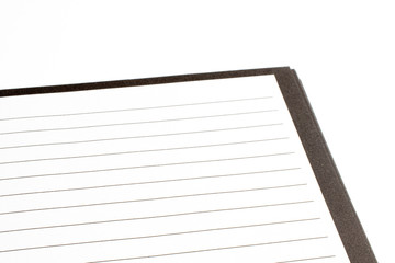 Opened spiral diary with blank pages with rows on white background, close-up shot with selective focus. reminder, education.