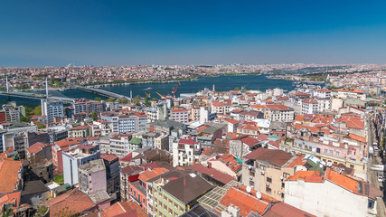 Fototapeta na wymiar The view from Galata Tower to Galata Bridge timelapse Golden Horn, Istanbul, Turkey