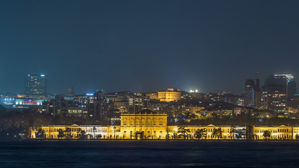 Fototapeta premium Mimar Sinan University night timelapse. View of besiktas district in istanbul taken from asian part of the city.