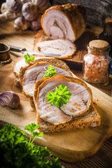 Tasty breakfast - dark bread with baked bacon.