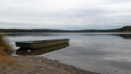 Boat on calm pond