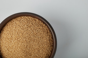 Raw organic amaranth grain in a bowl