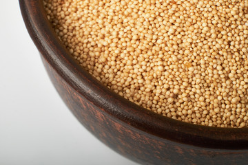 Raw organic amaranth grain in a bowl