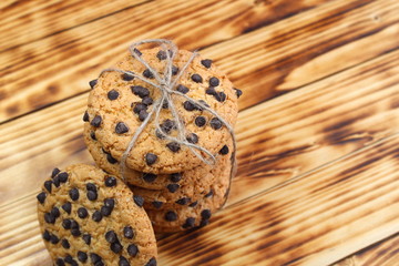 Cookies with chocolate chips stacked and tied with a thread