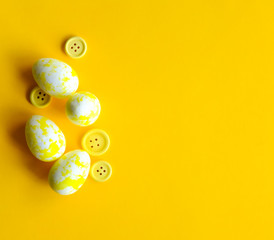 Yellow eggs and buttons.