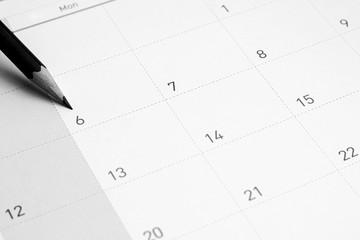 The pencil points to the 6 in the calendar.