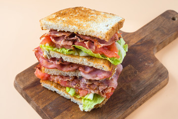 A BLT is a type of sandwich, named for the initials of its primary ingredients, bacon, lettuce and...